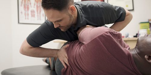 Chiropractor_Back_Male-732×549-Thumbnail 728755745