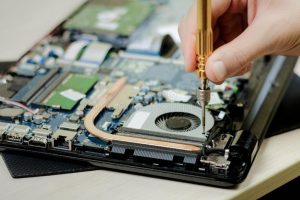 hand-dismantle-laptop-laptop-repair-screwdriver-close-up-hand-dismantle-laptop-laptop-repair-screwdriver-162454423